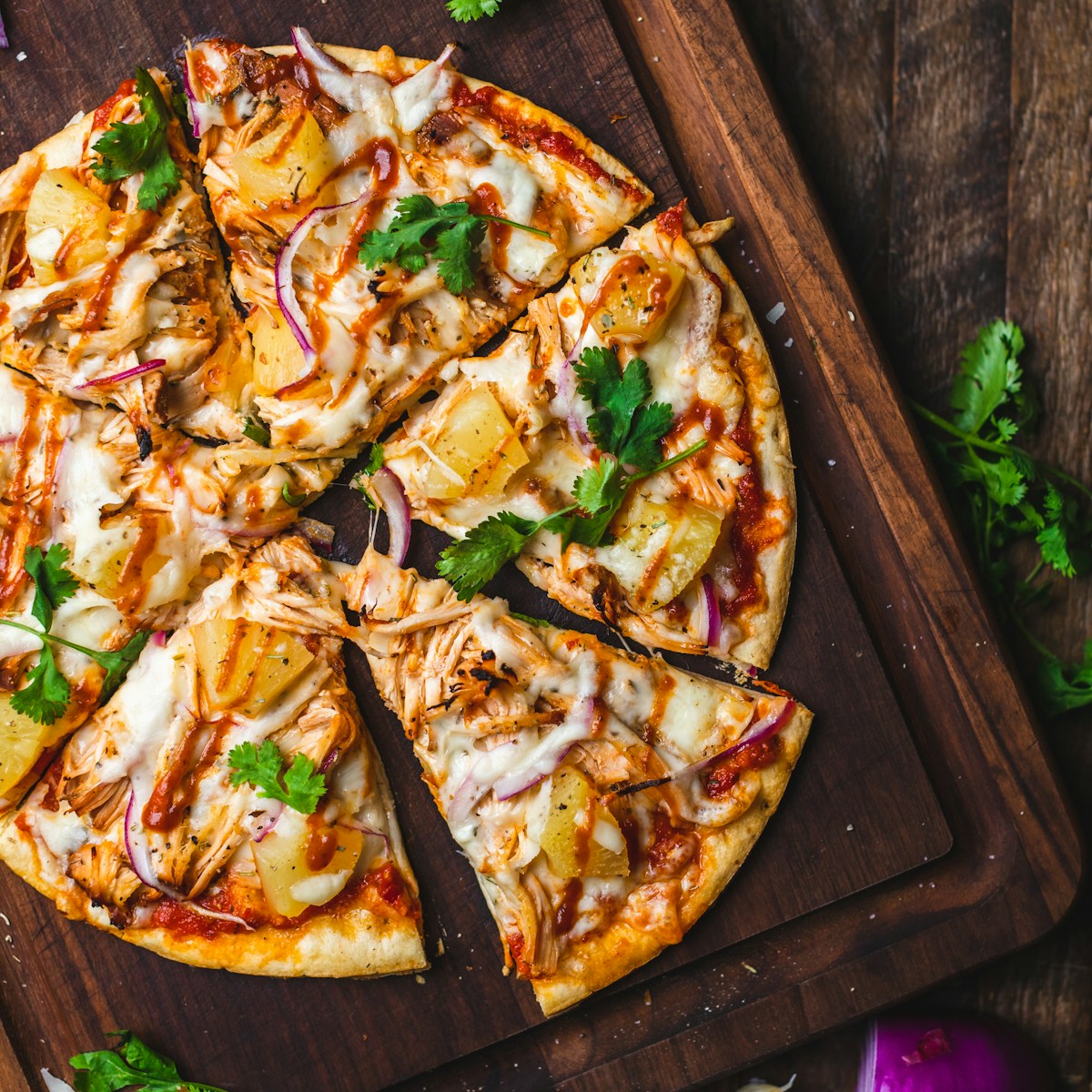 Freshly baked flatbread with vegetables and herbs